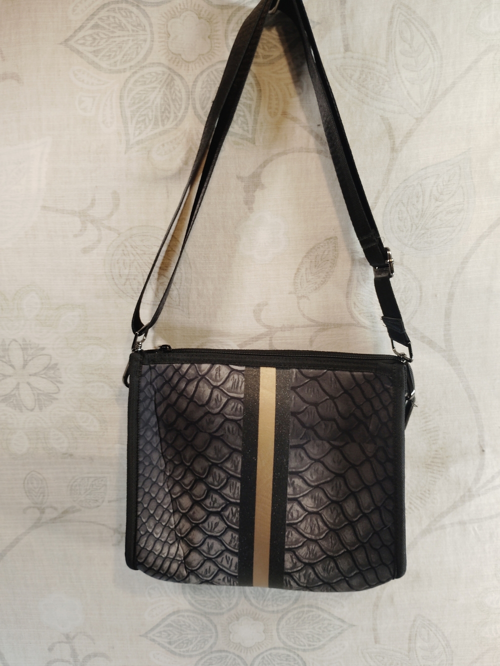 HAUTE SHORE Black Crossbody Bag with Gold Stripe& Snake Skin Graphic Design
